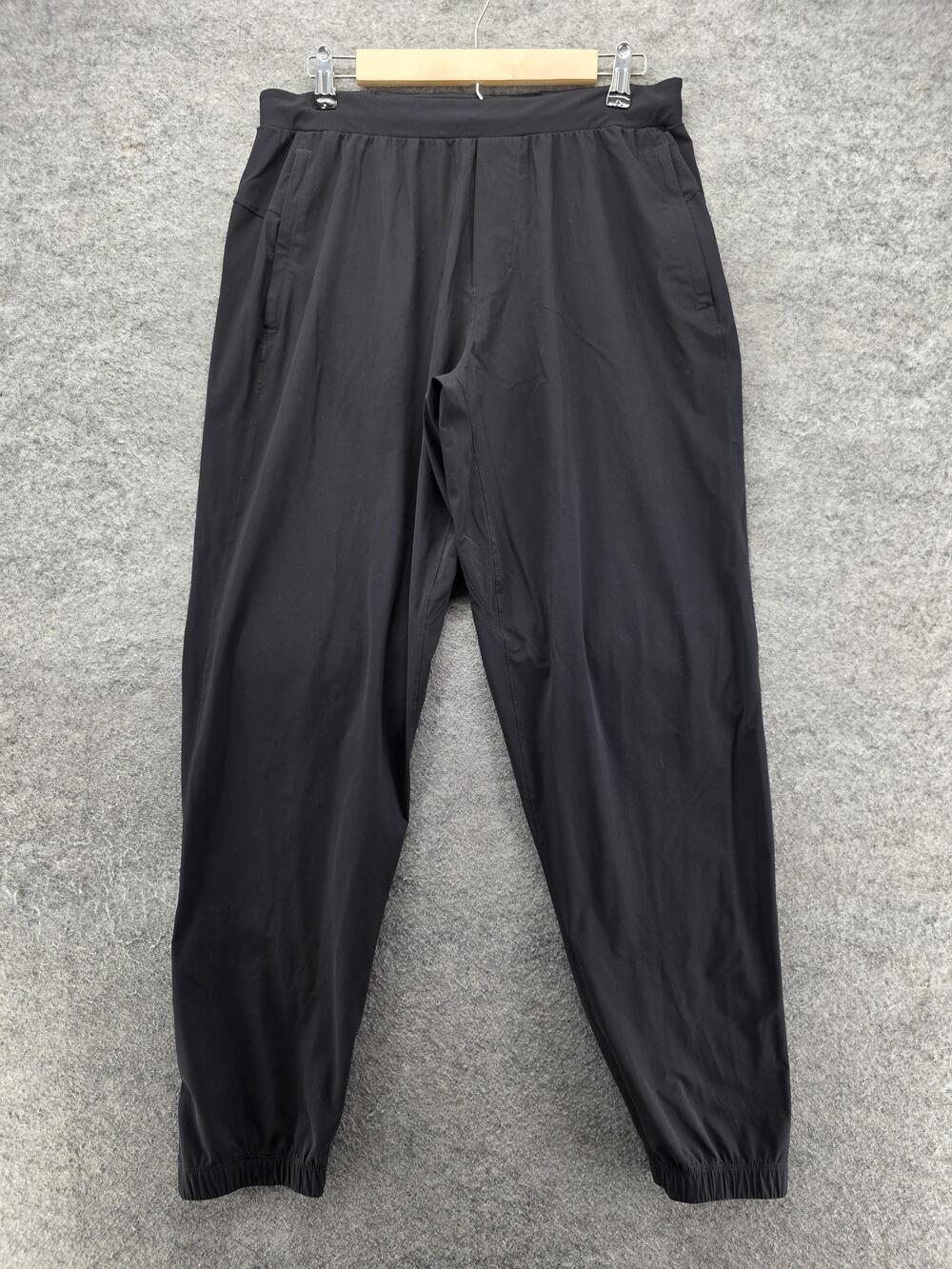 Lululemon Jogger Pants Womens L Black Elastic Waist Pockets Reflective Tapered